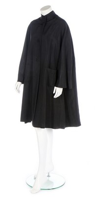 Lot 221 - A Balenciaga couture black faille coat, 1953,...