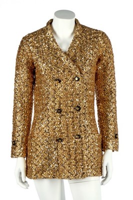 Lot 232 - A Chanel couture gold lurex-weave jacket, 1969,...
