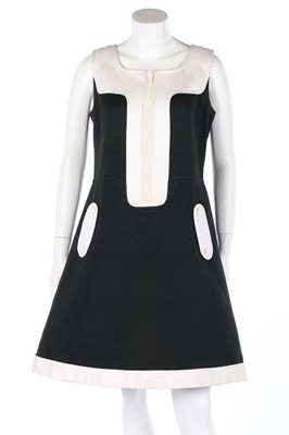 Lot 228 - A Courrges black and white cotton mini-dress,...