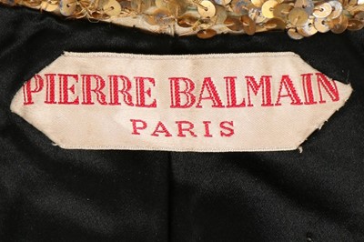 Lot 229 - A Pierre Balmain couture gold sequined coat or...