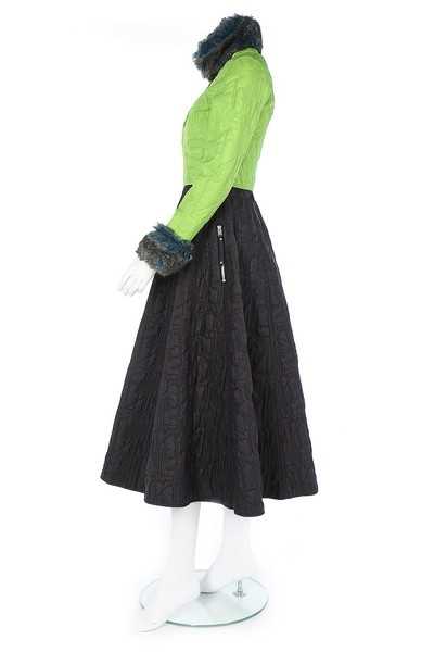 Lot 315 - A Jean Paul Gaultier quilted black dress and...