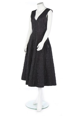Lot 315 - A Jean Paul Gaultier quilted black dress and...