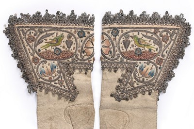 Lot 100 - A pair of men's embroidered leather gauntlet...
