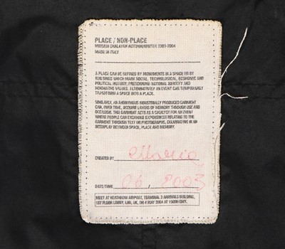 Lot 324 - A rare Hussein Chalayan man's black zippered...
