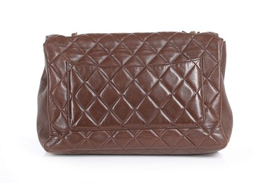 Lot 34 - A Chanel quilted brown leather shoulder bag,...