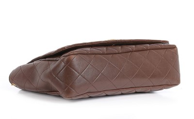 Lot 34 - A Chanel quilted brown leather shoulder bag,...