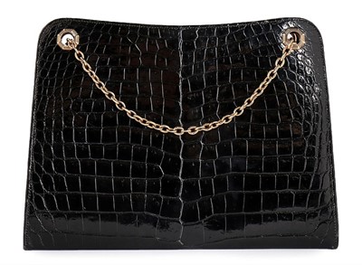 Lot 30 - A Cartier black crocodile handbag with 9ct...