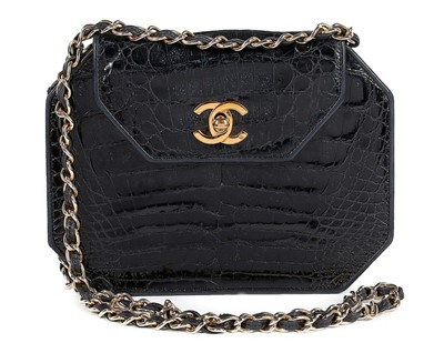 Lot 32 - A Chanel octagonal black alligator bag, 1980s