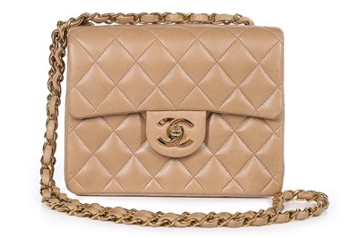 Lot 23 - A Chanel quilted beige leather bag, 1990s,...