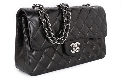 Lot 2 - A Chanel black quilted leather 2.55 bag, 1990s,...