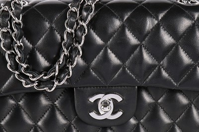 Lot 2 - A Chanel black quilted leather 2.55 bag, 1990s,...