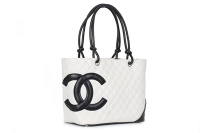 Lot 1 - A Chanel quilted white leather shopper, 1990s,...