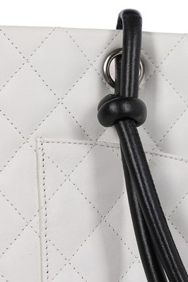 Lot 1 - A Chanel quilted white leather shopper, 1990s,...