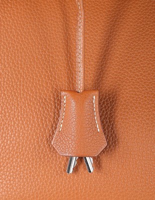 Lot 6 - An Hermès tan togo leather Birkin, 2002, blind...