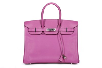 Lot 9 - An Hermès cyclamen-pink togo leather Birkin,...