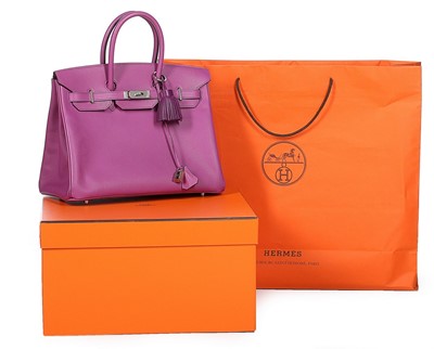 Lot 9 - An Hermès cyclamen-pink togo leather Birkin,...