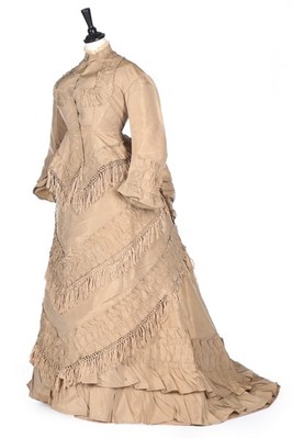 Lot 142 - A taupe taffeta gown with day and evening...