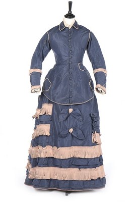 Lot 136 - A bi-colour silk faille gown, late 1870s, the...