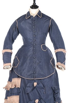 Lot 136 - A bi-colour silk faille gown, late 1870s, the...