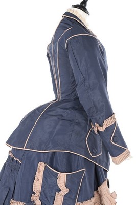 Lot 136 - A bi-colour silk faille gown, late 1870s, the...