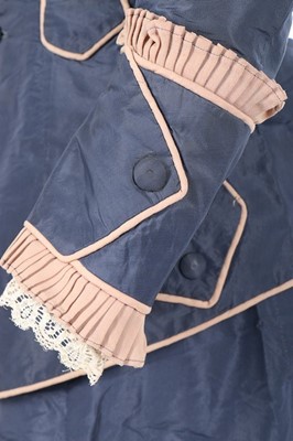 Lot 136 - A bi-colour silk faille gown, late 1870s, the...