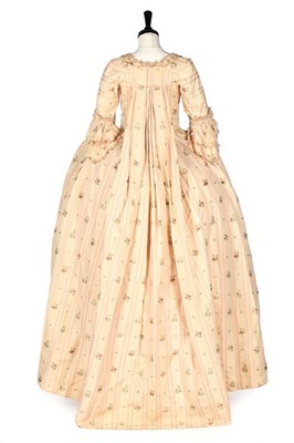 Lot 116 - A striped and floral brocaded pink silk robe à...