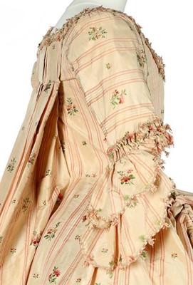 Lot 116 - A striped and floral brocaded pink silk robe à...