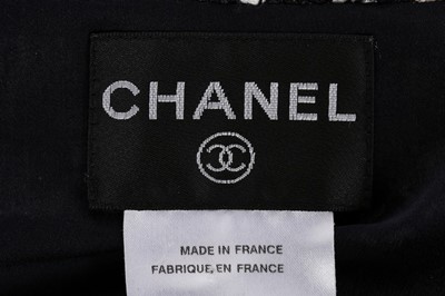 Lot 75 - A Chanel Lesage tweed sleeveless coat, circa...