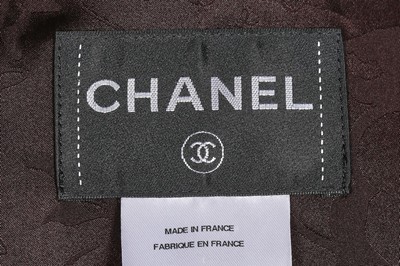 Lot 76 - A Chanel red and black bouclé coat, modern,...