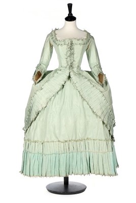 Lot 102 - A peppermint-green silk 'Circassienne' robe,...