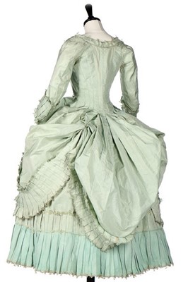 Lot 102 - A peppermint-green silk 'Circassienne' robe,...