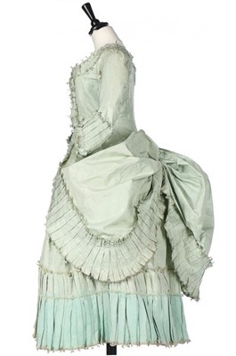 Lot 102 - A peppermint-green silk 'Circassienne' robe,...