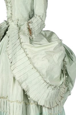 Lot 102 - A peppermint-green silk 'Circassienne' robe,...