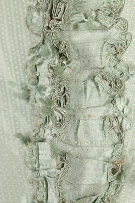 Lot 102 - A peppermint-green silk 'Circassienne' robe,...