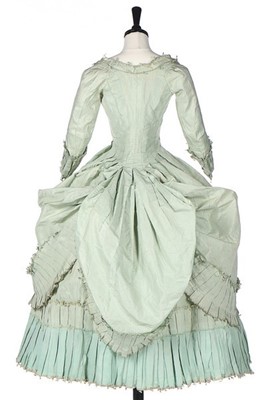 Lot 102 - A peppermint-green silk 'Circassienne' robe,...