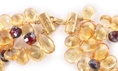 Lot 56 - A citrine and treated garnet necklace by Jaded,...
