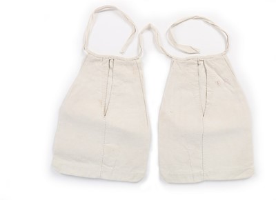 Lot 119 - A woman's linen night shirt and a pair of...