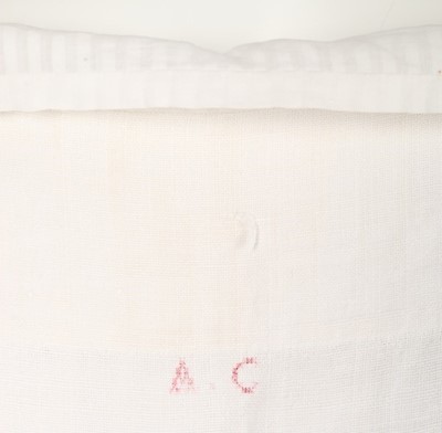 Lot 119 - A woman's linen night shirt and a pair of...