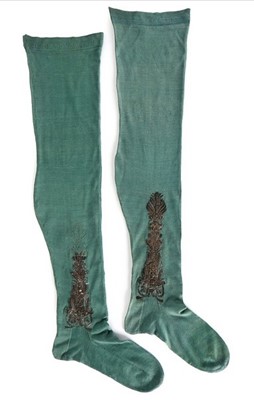 Lot 103 - A pair of teal silk stockings, early 18th...