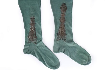 Lot 103 - A pair of teal silk stockings, early 18th...