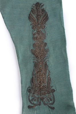 Lot 103 - A pair of teal silk stockings, early 18th...