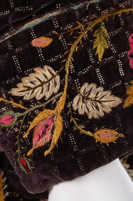 Lot 112 - A printed and embroidered black velvet court...