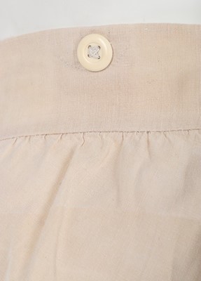 Lot 135 - A pair of Holland-cotton men's trousers, circa...