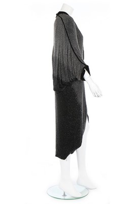 Lot 176 - A Paul Poiret ombré-effect beaded opera coat,...