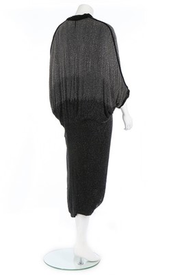 Lot 176 - A Paul Poiret ombré-effect beaded opera coat,...