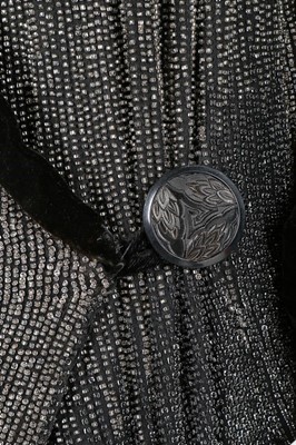 Lot 176 - A Paul Poiret ombré-effect beaded opera coat,...