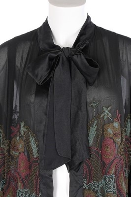 Lot 173 - A finely beaded muslin jacket, mid 1920s,...
