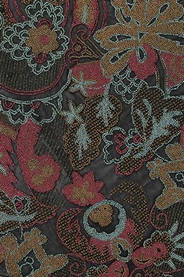 Lot 173 - A finely beaded muslin jacket, mid 1920s,...