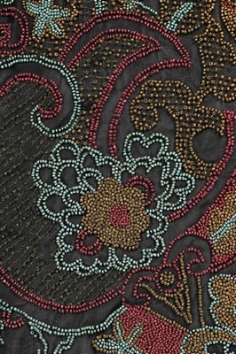 Lot 173 - A finely beaded muslin jacket, mid 1920s,...