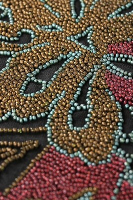 Lot 173 - A finely beaded muslin jacket, mid 1920s,...